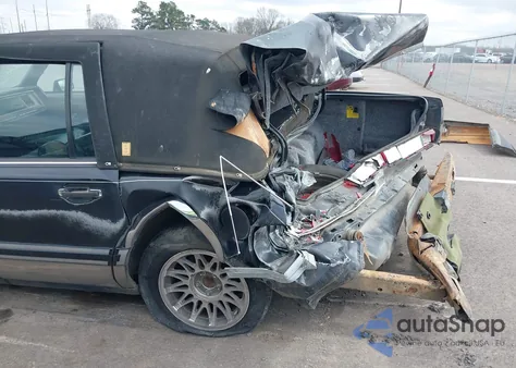 1991 Lincoln Town Car Signature z USA, uszkodzony, nr VIN 1LNCM82W9MY688407